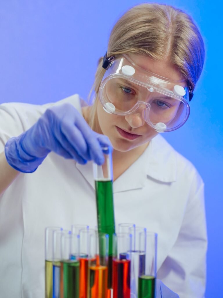 Laboratory technician testing an essential oil sample for GC-MS and CLP compliance