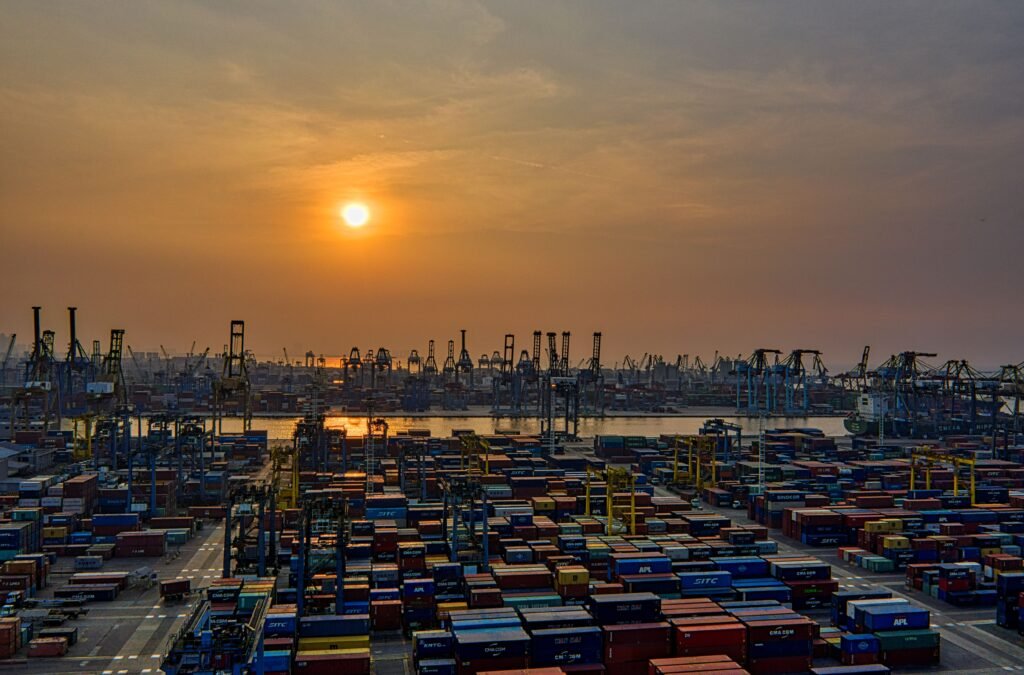 Shipping containers at a seaport, representing a shipment of bulk essential oils imported into the Philippines