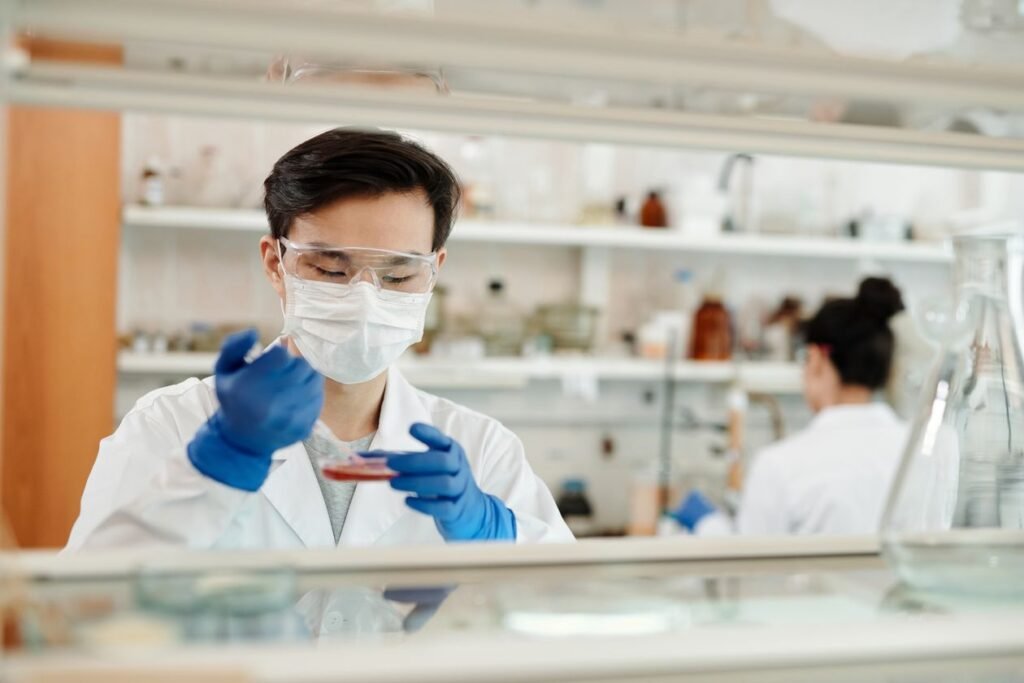 Laboratory technician running GC-MS testing on food grade essential oils