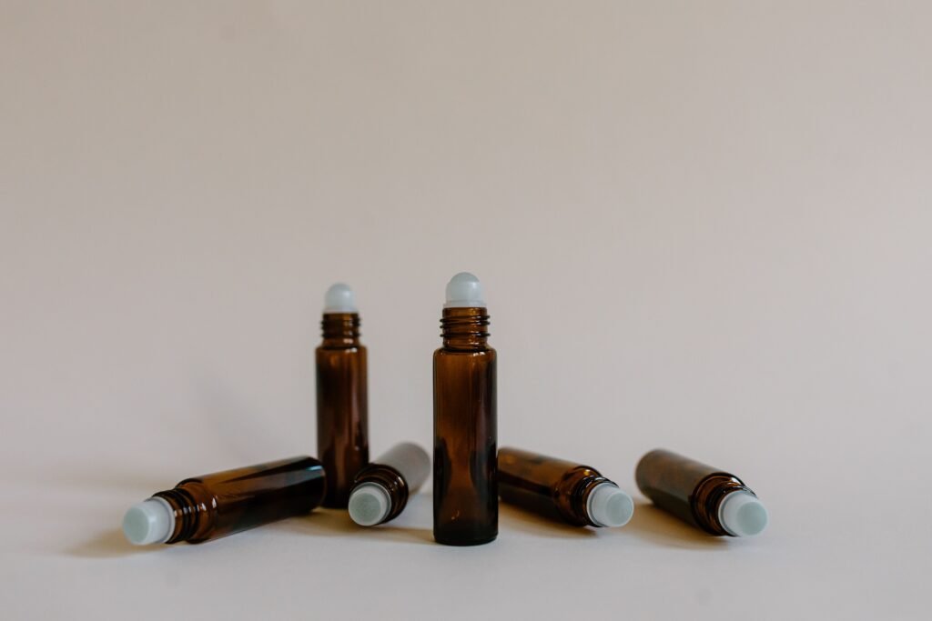 Amber glass bottles of bulk essential oil packaged for export to Indonesia
