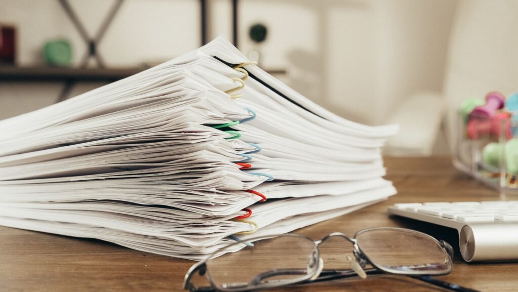 Export invoice and customs paperwork reviewed for essential oil HS code classification before a Brazil-bound shipment